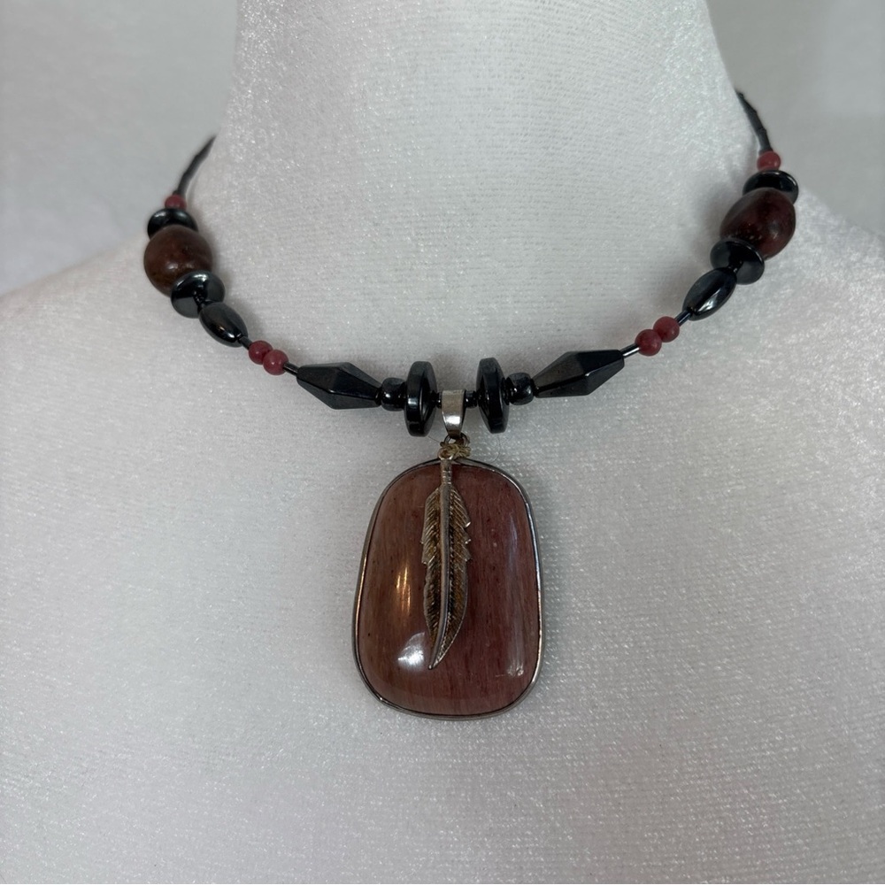 Elegant Black and Pink Beaded Necklace with Feather Pendant